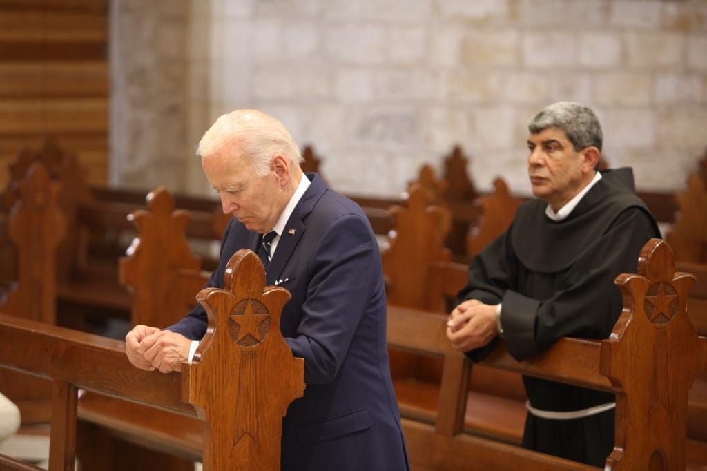 President Joe Biden praying at the Church of Nativity in Bethlehem