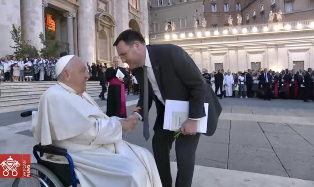 Rev Brown and Pope exchange remarks