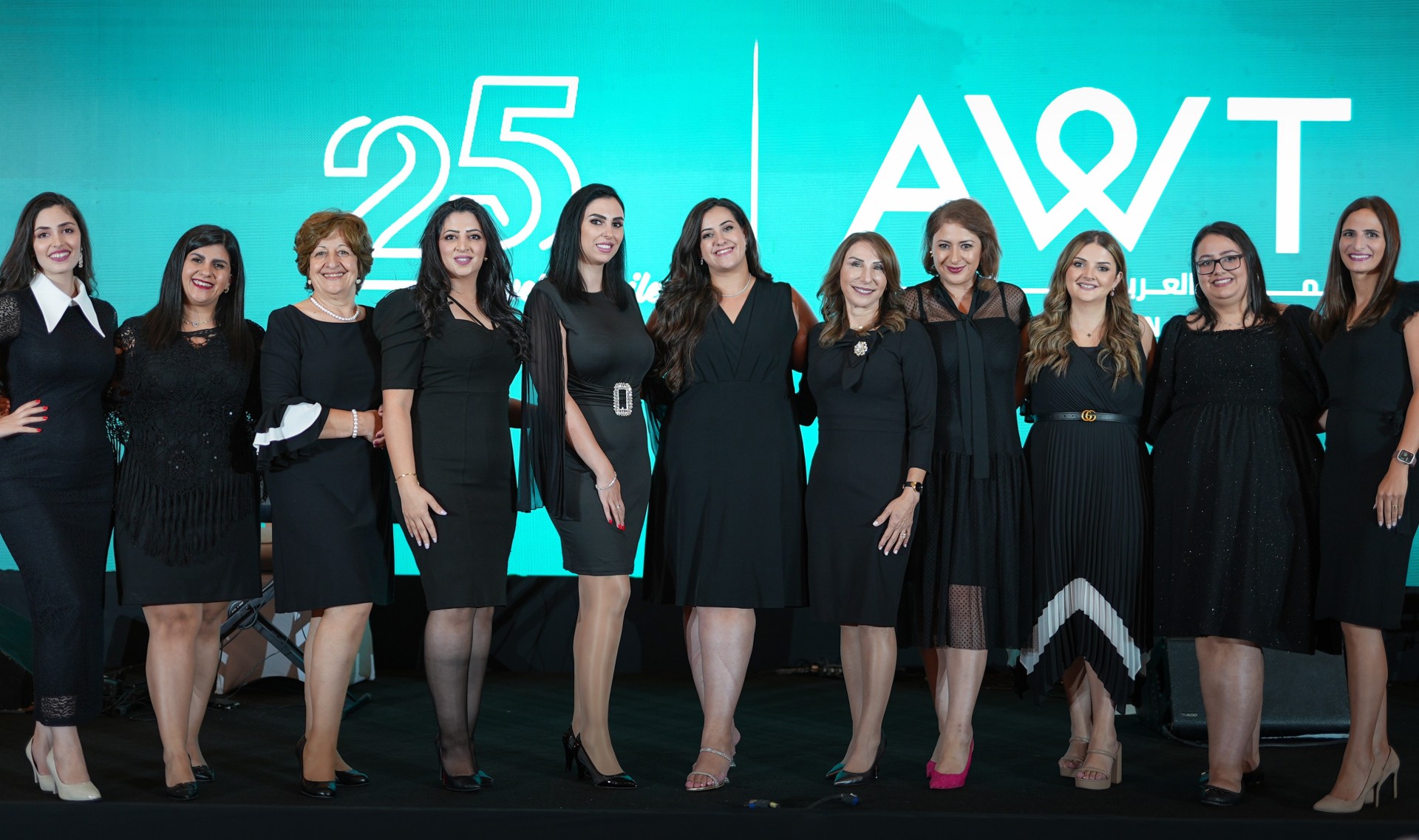 Staff of Arab Woman Today celebrating 25 years